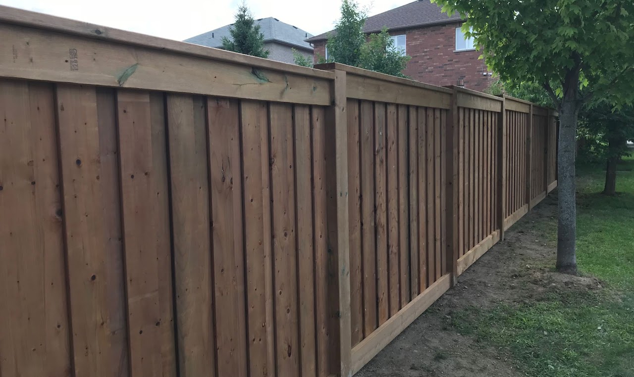 Cedar privacy fence installation in Toronto backyard